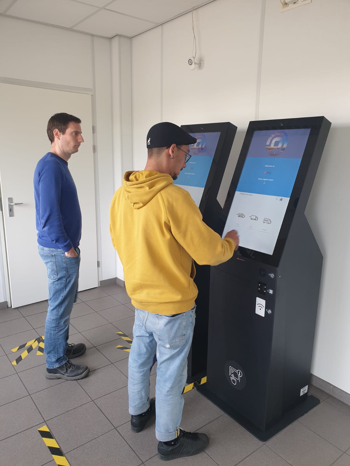 Drivers checking in on indoor kiosks powered by Peripass